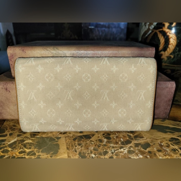 LOUIS VUITTON MINIRUN - Picture 7 of 8